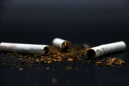 Smoking cigarettes ash and ashtrayの写真素材