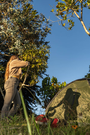 latina woman camping aloneの写真素材