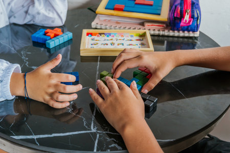 Latino children in glasses, studying and doing homework at home. Back to school. Childhood. Learning...