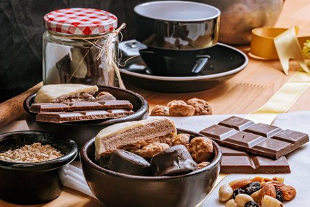 Chocolate chip cookies, chocolate bar and white chocolate, small bowl oatmeal and nuts....