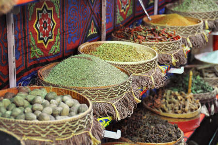  Oriental Bazaar in Egypt   Different oriental spices laid out in the trays stand at shop windowの写真素材