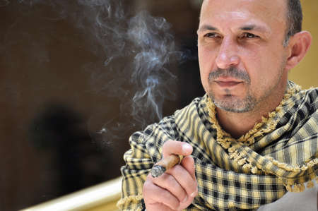 Portrait of a man with cigarの写真素材