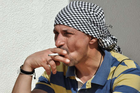 Portrait of a man with a cigaretteの写真素材