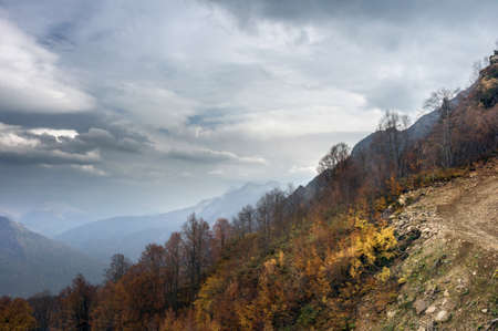 Mountain peaks of the Caucasus at Krasnaya Polyana, the village Rosa Khutor, winter sports resort of...