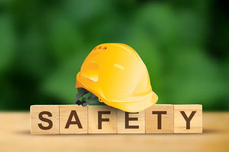 safety first, construction concept, Yellow safety hard hatの写真素材