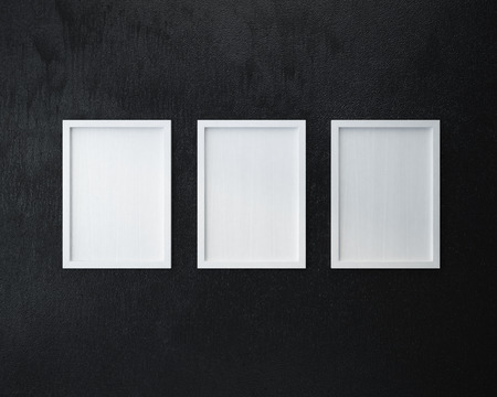 3 Blank frame on  black wall.の写真素材