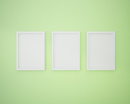 3 Blank frame on  lime green wall.の写真素材