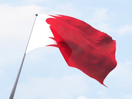 Bahrain flag flying on clear sky.の写真素材