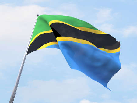 Tanzania flag flying on clear sky.の写真素材