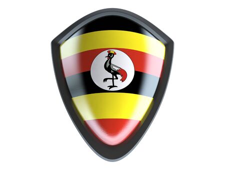 Uganda flag on metal shield isolate on white background.の写真素材