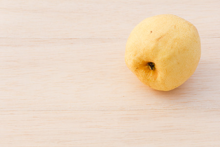 Asian pear on wood backgroundの写真素材