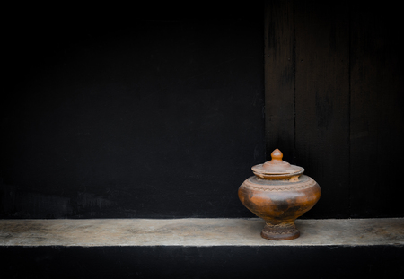 Pottery drinking water jar from northen thailand backgroundの写真素材