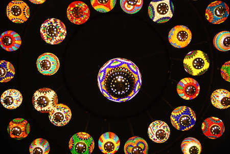 Colourful lamps made from colourful stainglass glow in the darkの写真素材