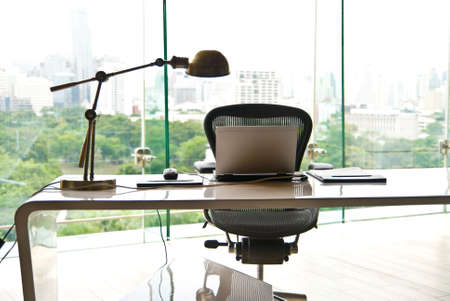 Notebook on a desk at modern officeの写真素材