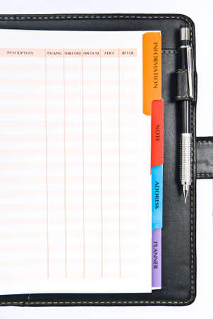 pencil on opened a notebook on a white backgroundの写真素材