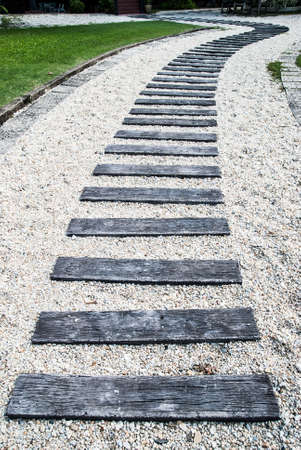 Wooden path walkway  to the old house の写真素材