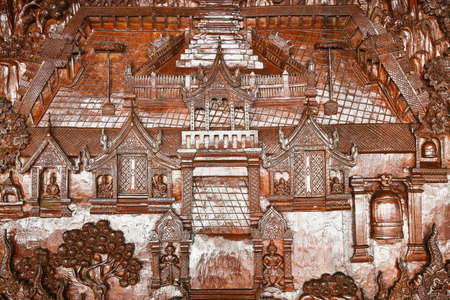 An ancient mural wood carving in Phra That Doi Suthep at Chiangmai Thailand の写真素材
