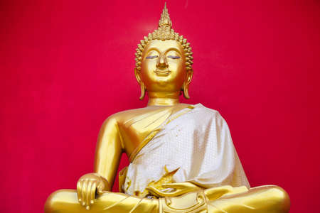 Golden Buddhas Image in a Buddhist temple at thailand の写真素材