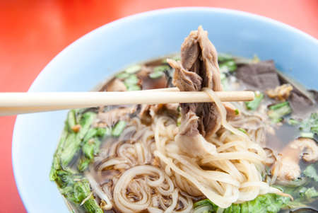 Image of delicious Thai noodle with duck meat の写真素材
