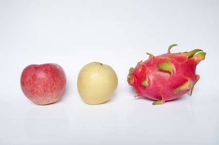 red apple ,Chinese pear and Dragon fruit  isolated on white background の写真素材