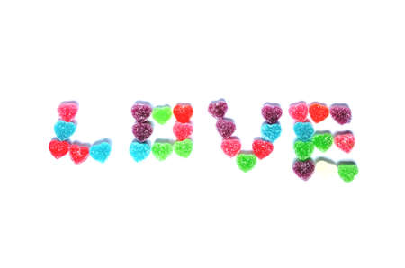 Fruit jellies candy hearts on white backgroundの写真素材
