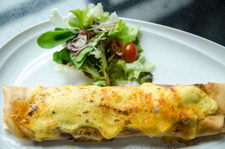 A plate of lean chicken fajitas with cheddar cheeseの写真素材