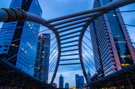 business area, Night view of high buildings and public sky walkの写真素材