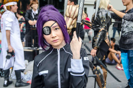 BANGKOK - SEPTEMBER 01   An unidentified Japanese anime cosplay pose in Japan Festa in Bangkok 2013...