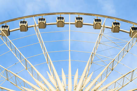 cabins Ferris wheel on a background of skyのeditorial素材