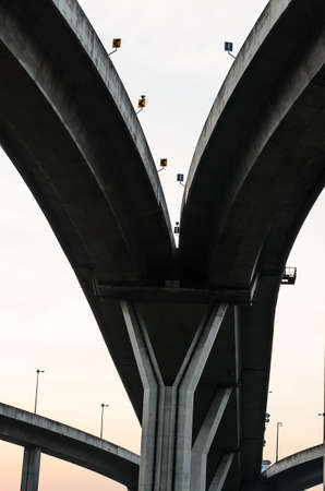 The industrial ring road  and sunset in thailandの写真素材