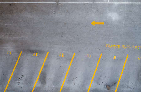 Empty parking lot with yellow linesの写真素材