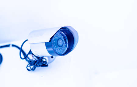 Security CCTV Camera on the white wallの写真素材