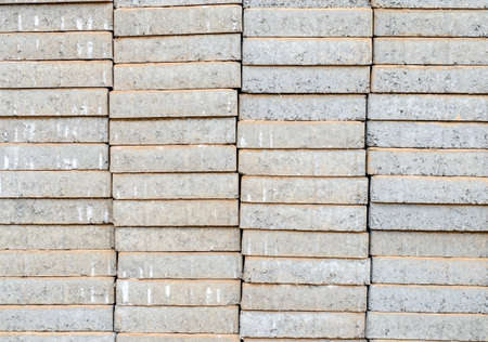 Pallets of breeze blocks at a construction site from a builders merchant known as cinder blocks in the us or Concrete masonry unitsの写真素材