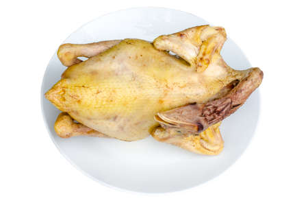 boiled chicken in plate on a white backgroundの写真素材