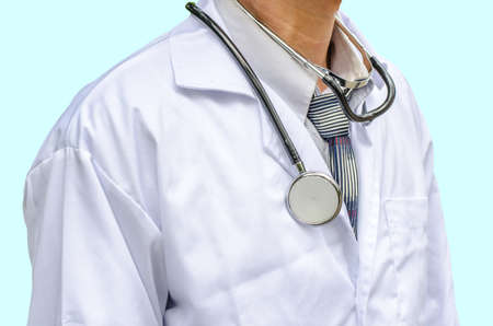 Close-up doctor with stethoscope, isolated on blue backgroundの写真素材