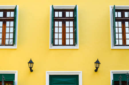 Three window balance and yellow hotel detailの写真素材