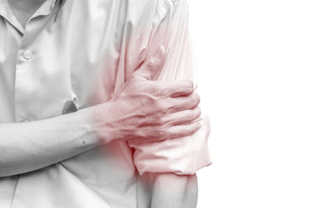 Young attractive business man having shoulder pain isolated 