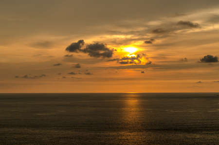 Sunsets at the sea in thailand. Horizontal photo with natural light and darknessの写真素材