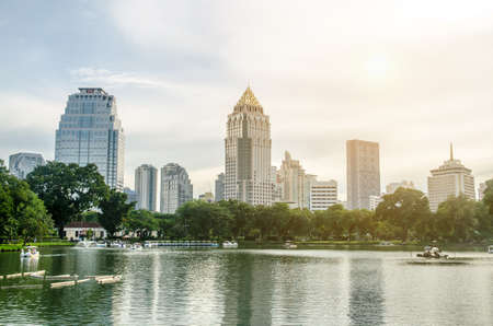 BANGKOK - Nov 7: Lake view of Lumpini Park in the Thai capital's city centre on july 7, 2015 in Bangkok, Thailand. Lumpini Park covers 142 acres with 2.5 km of pathways and a large boating lake.のeditorial素材