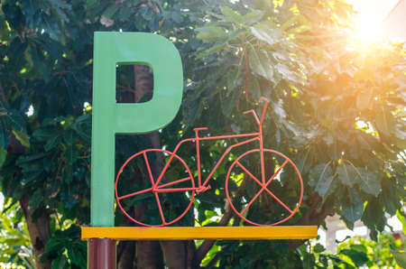 Bicycle parking sign in public parkの写真素材