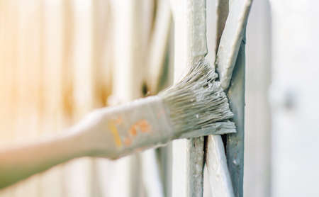 painting  door in grey color by brushの写真素材