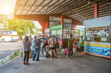 Nong khai - Thailand May 5, 2016 :  Tourists stand in line to buy a bus ticket to the town on May 5, 2016 in Nong khai, Thailand.のeditorial素材