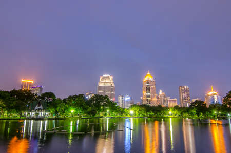 Cityscape at  Modern business area garden at dusk with twilight cloud in Bangkok, Thailandのeditorial素材