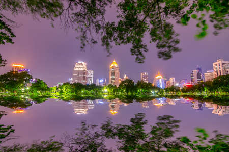 Cityscape at  Modern business area garden at dusk with twilight cloud in Bangkok, Thailandのeditorial素材