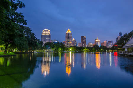 Cityscape at  Modern business area garden at dusk with twilight cloud in Bangkok, Thailandのeditorial素材