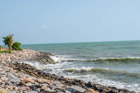 sea wave splashing on rockの写真素材