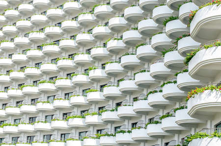 Many Windows and balcony on residential building hotel