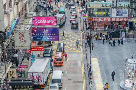 HONG KONG , CHINA - 7 DEC 2016: Street crossing at morning on December 7, 2016 in Hong Kong, China. Hong Kong have many building and road crossing intersection.のeditorial素材