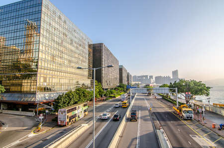 HONG KONG - December 8: Aerial view on the street in morning on Dec 8, 2016 in Tsim Sha Tsui, Kowloon Hong Kong. With a land mass of 1,104 km and a population of 7 million people, Hong Kong is one of the most populated areas in the worldのeditorial素材