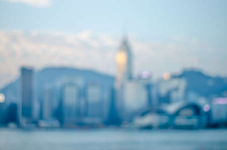 Blurred lights Hong Kong city downtown water front, abstract backgroundの写真素材